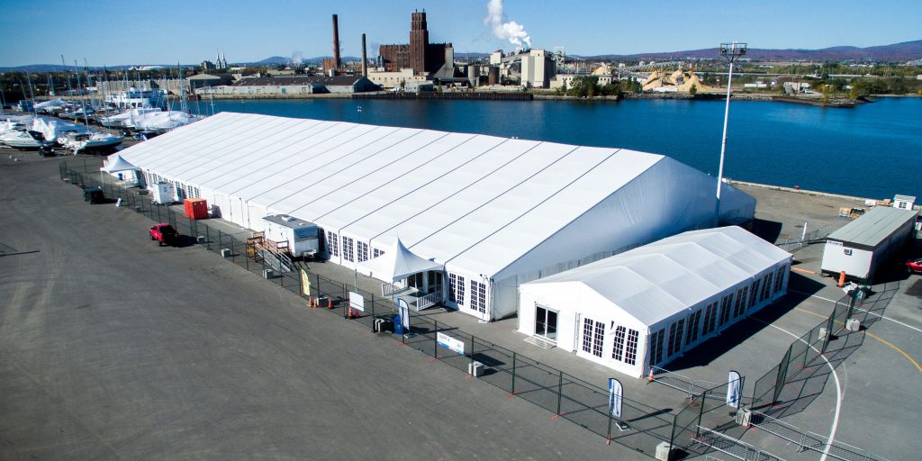 Large festival event structure tents for production and VIP hospitality at outdoor events